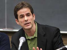 A man speaking to a group